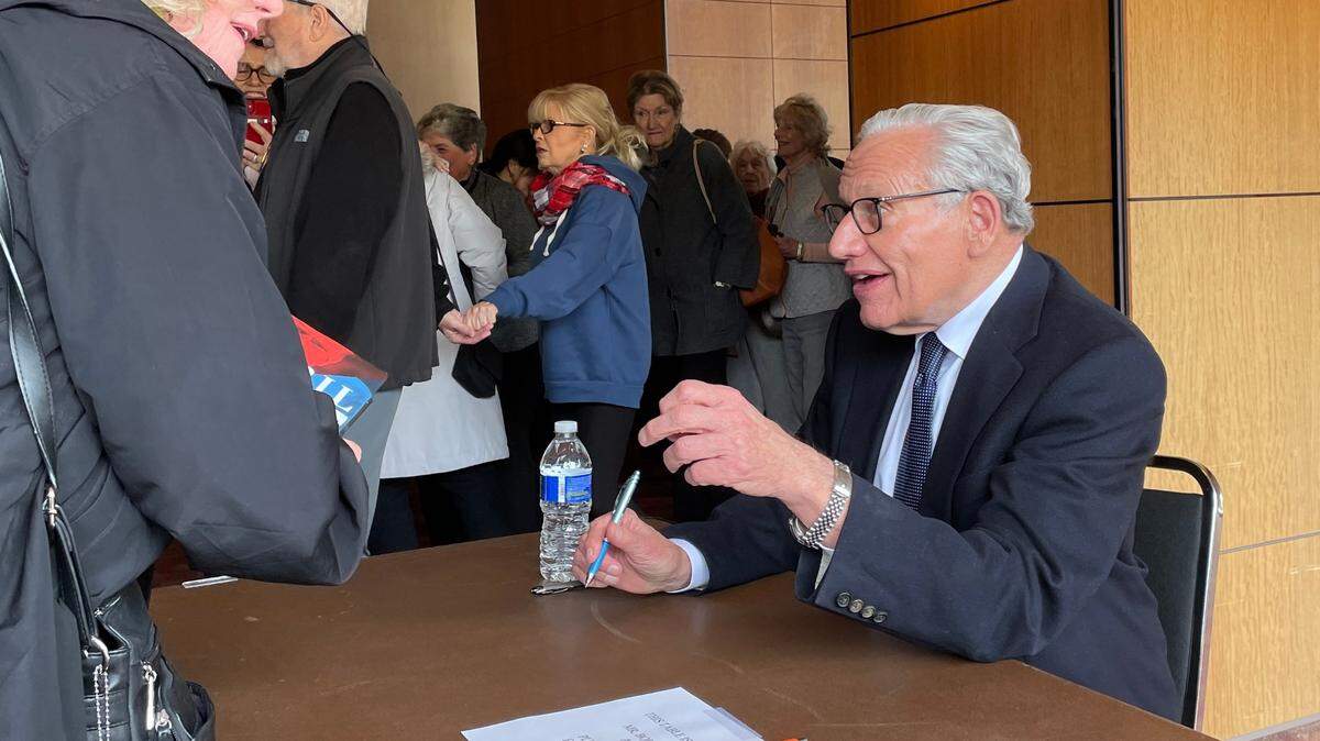 Washington Post’s Bob Woodward, best known for his coverage of the Watergate scandal, signs his book for dozens of readers following his talk at the William Saroyan Theatre in Fresno on Wednesday, March 29, 2023.