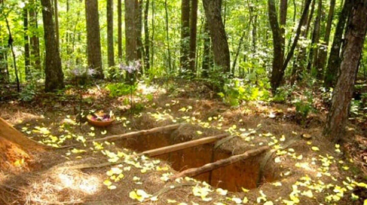 In a green burial, a body is placed in an unlined grave. The remains will decompose and provide nutrients to nearby plants.