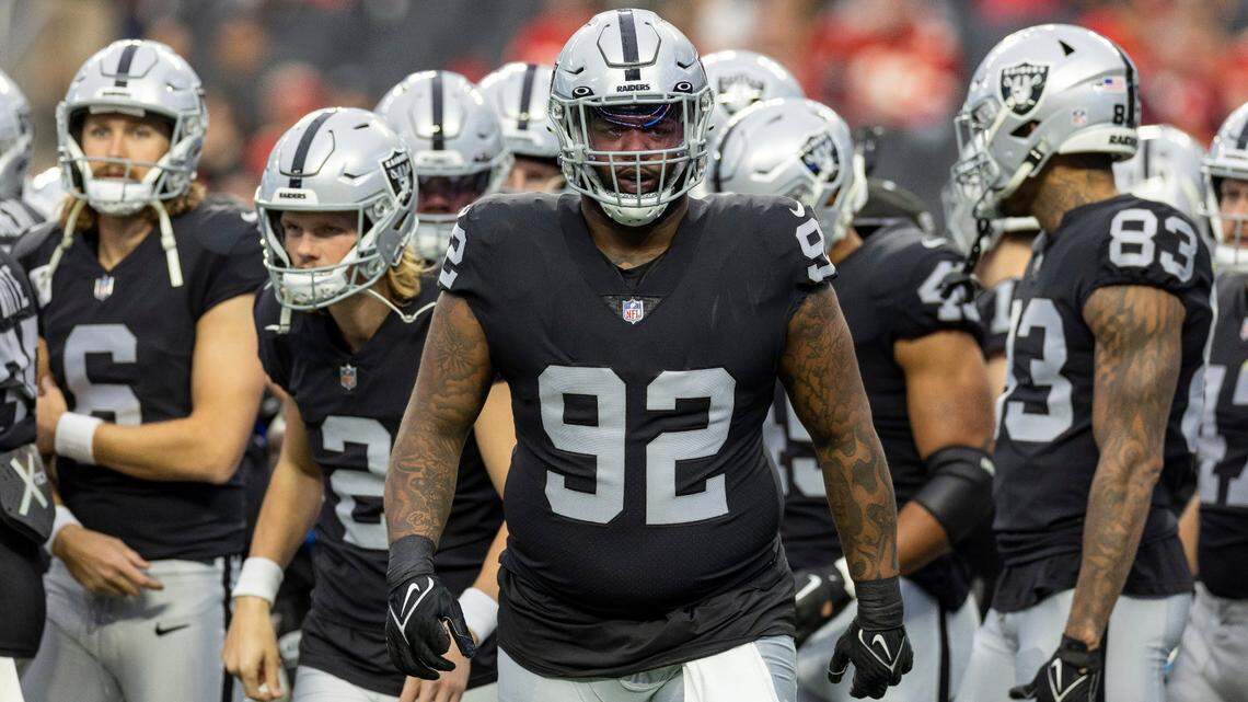 Las Vegas Raiders defensive tackle Neil Farrell, Jr. warms up before playing against the Kansas City Chiefs in an NFL game, Saturday, Jan. 7, 2023, in Las Vegas, NV.