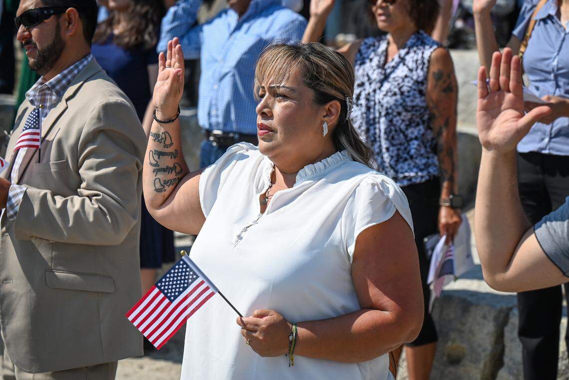 Erika Guadalupe Ramos Hernandez, an immigrant from Mexico and currently living in Selma, gives the Oath of Allegiance during a naturalization ceremony at Yosemite National Park on Wednesday, Sept. 17, 2025.