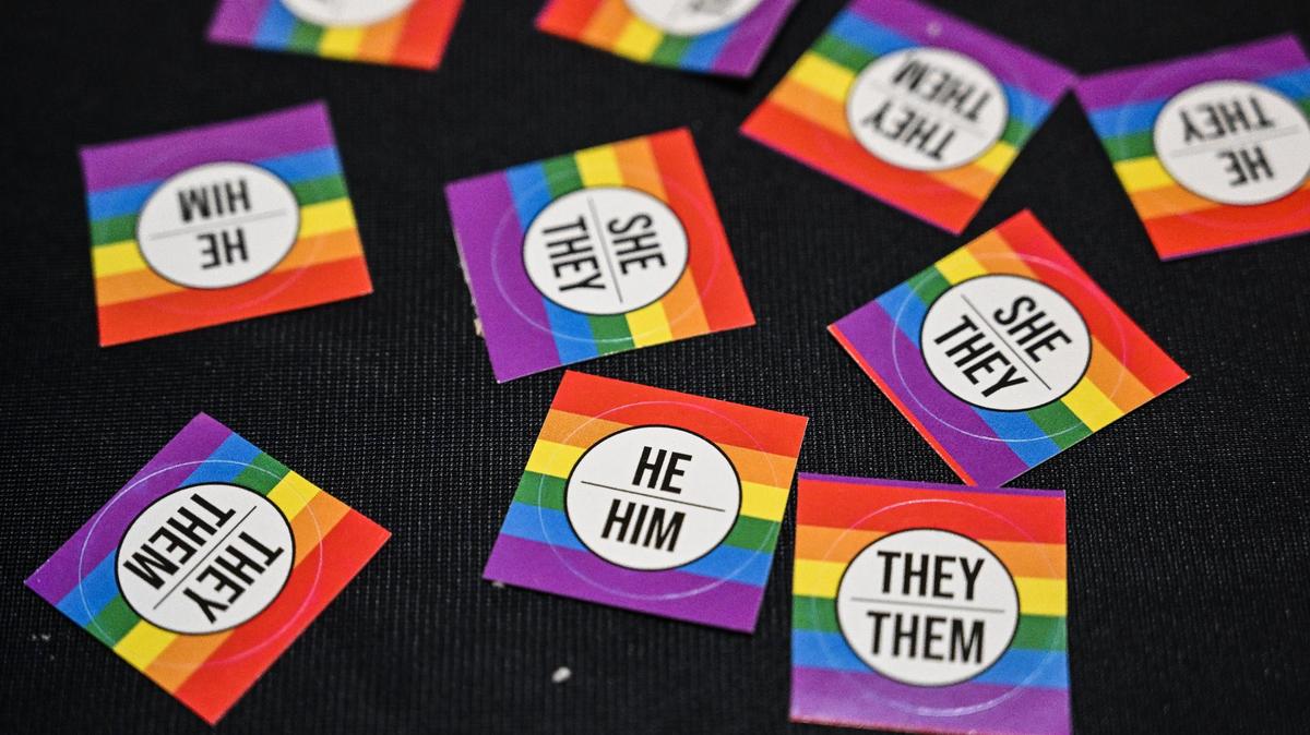 Pronoun stickers are laid out for students and staff in the Academic Center at Clovis Community College in Clovis following a ceremony to recognize June as Pride Month at the campus on Thursday, June 1, 2023.
