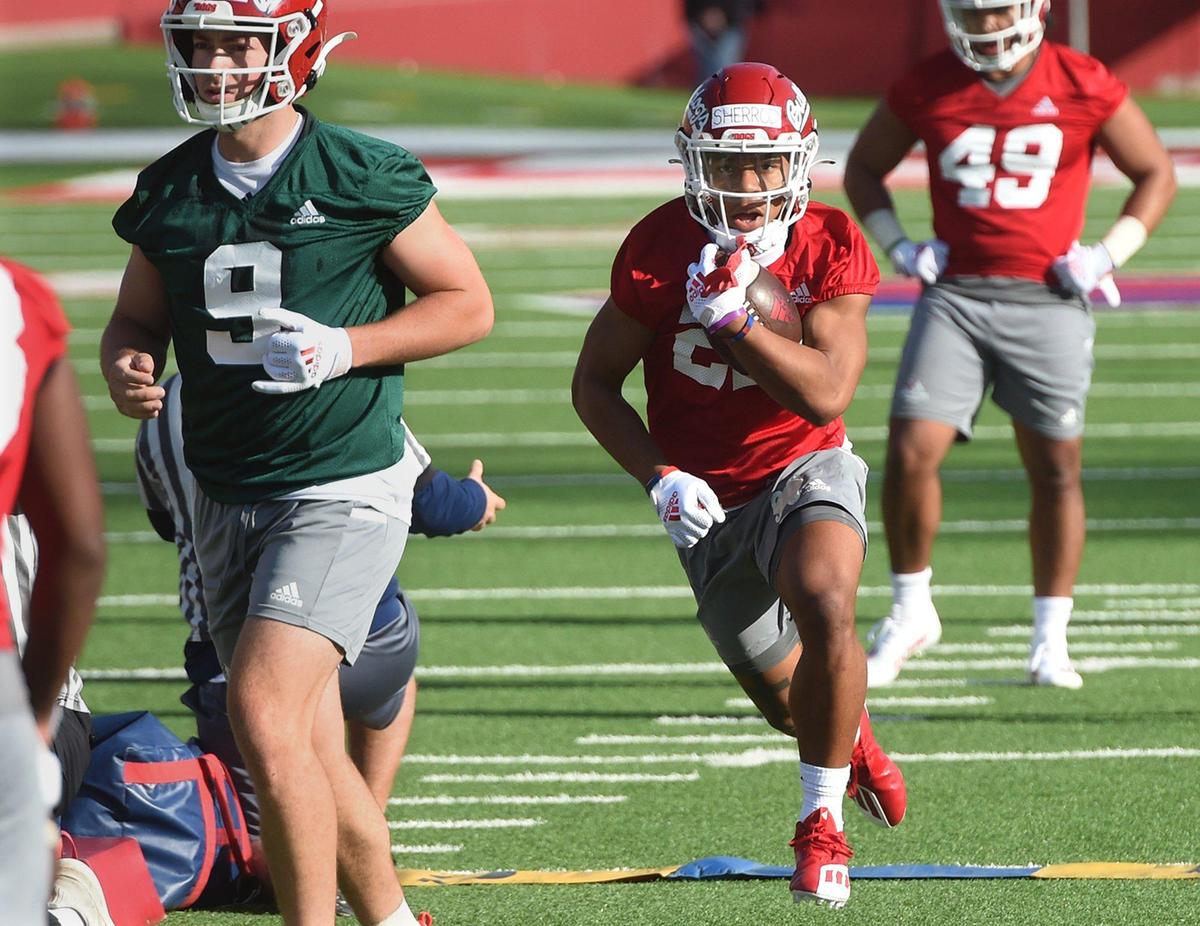 Bulldog running Malik Sherrod goes through a drill on the first day of spring practice, Monday March 21, 2022.