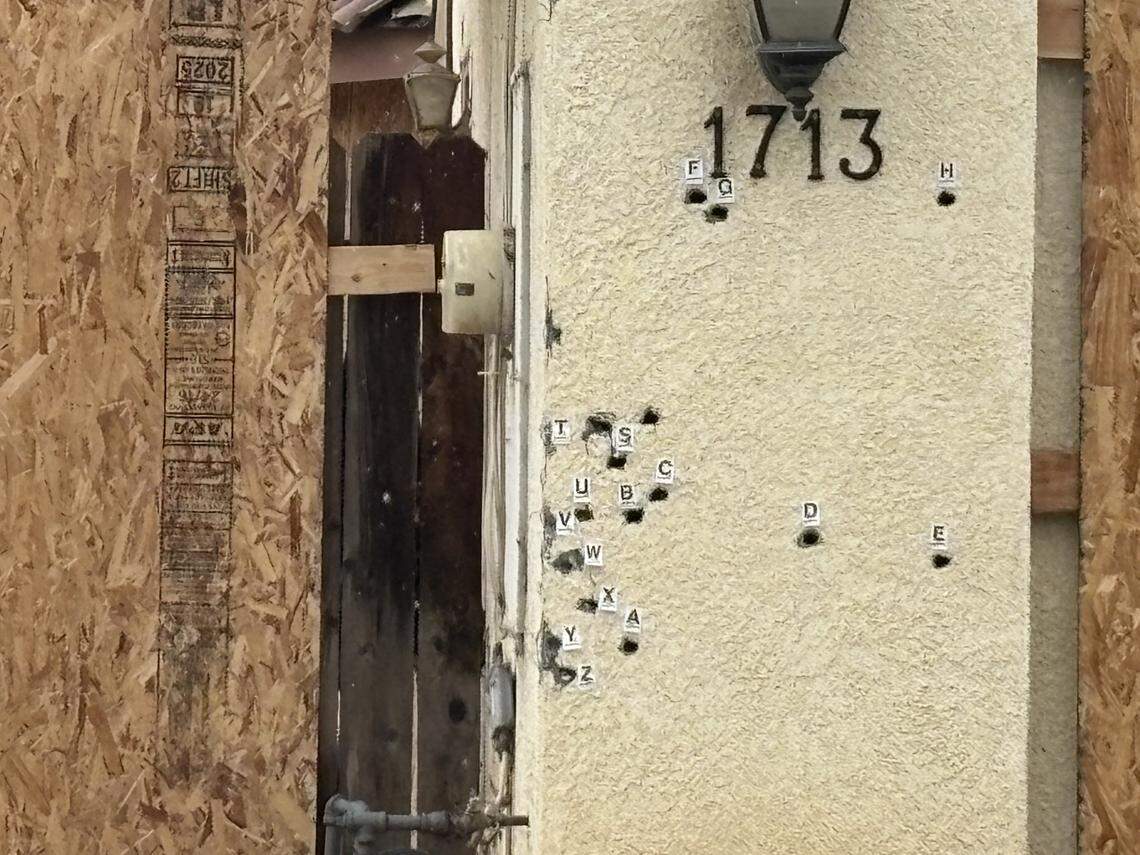 Bullet holes can be seen in the alleged shooter’s house on West Brian Avenue in north Porterville, California on Monday, April 13, 2026.