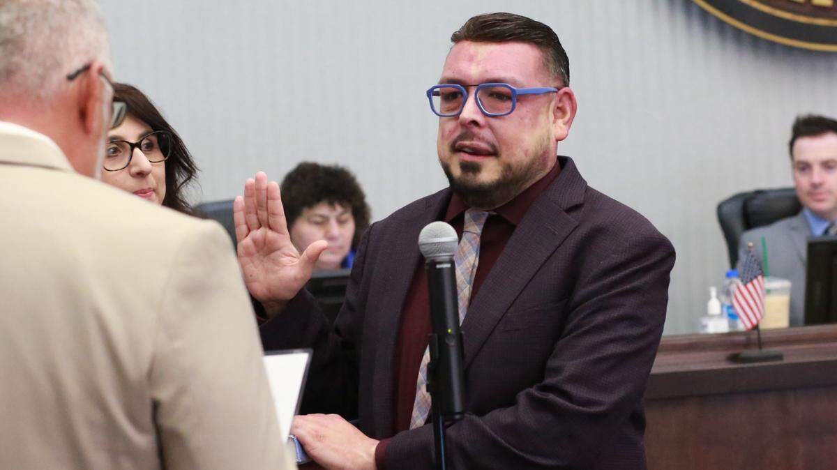 Veteran politician Eddie Valero (center) made history Tuesday morning at the Tulare County Board of Supervisors Chambers when he was sworn in to a second term to represent District 4.