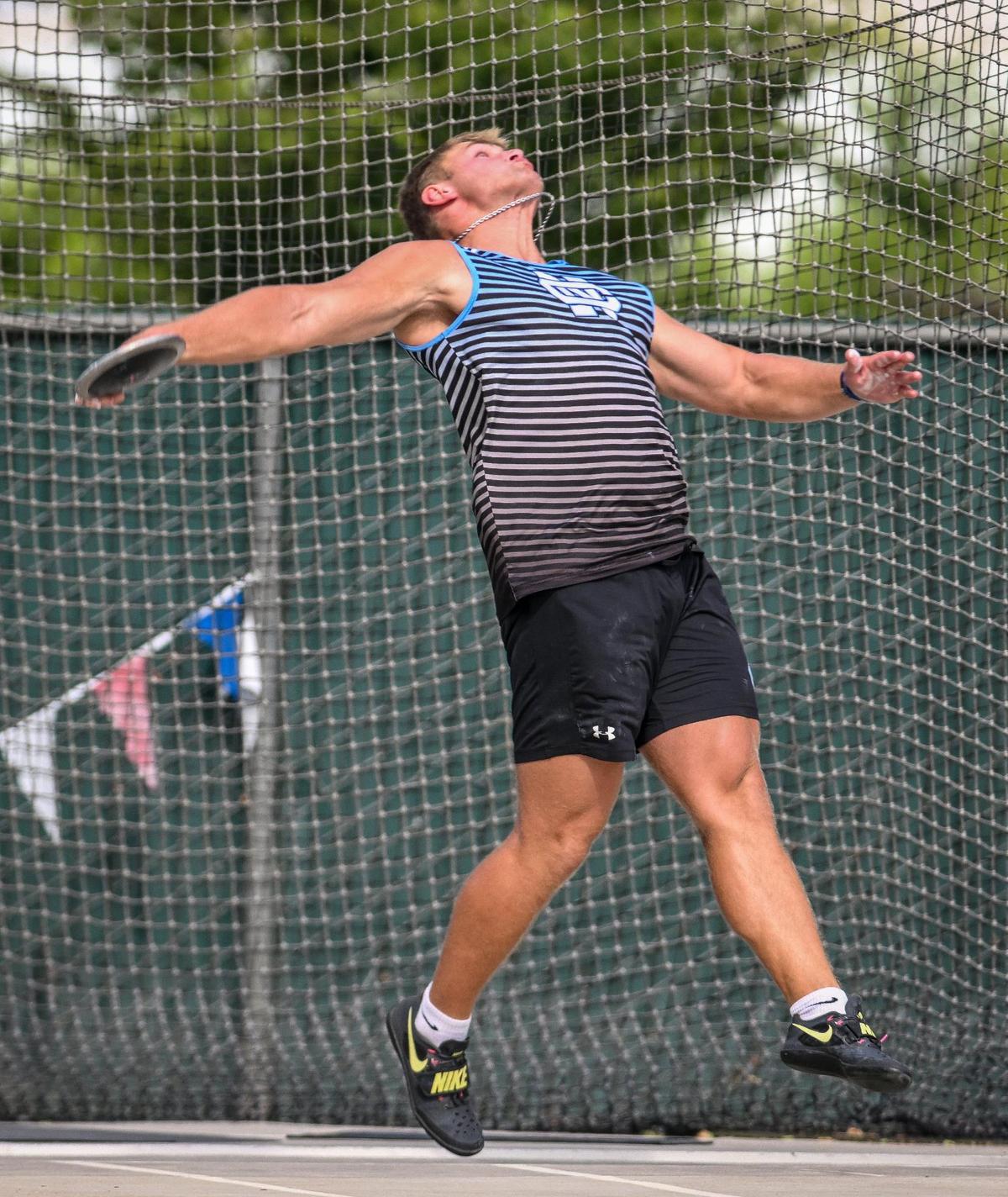 McKay Madsen of Clovis North throws in the discus event during the CIF state track & field finals at Buchanan’s Veterans Memorial Stadium in Clovis on Saturday, May 31, 0225.