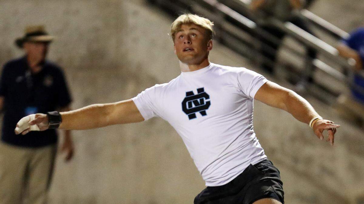 Clovis North junior McKay Madsen watches his winning shot put at the 2024 CIF Track and Field Championships at Buchanan High (Clovis) on May 25, 2024. Madsen added the shot put title to the discus championship with a toss of 62 feet, 9 1/2 inches to edge senior teammate Brayden Bitter’s 62-02 1/2 toss.