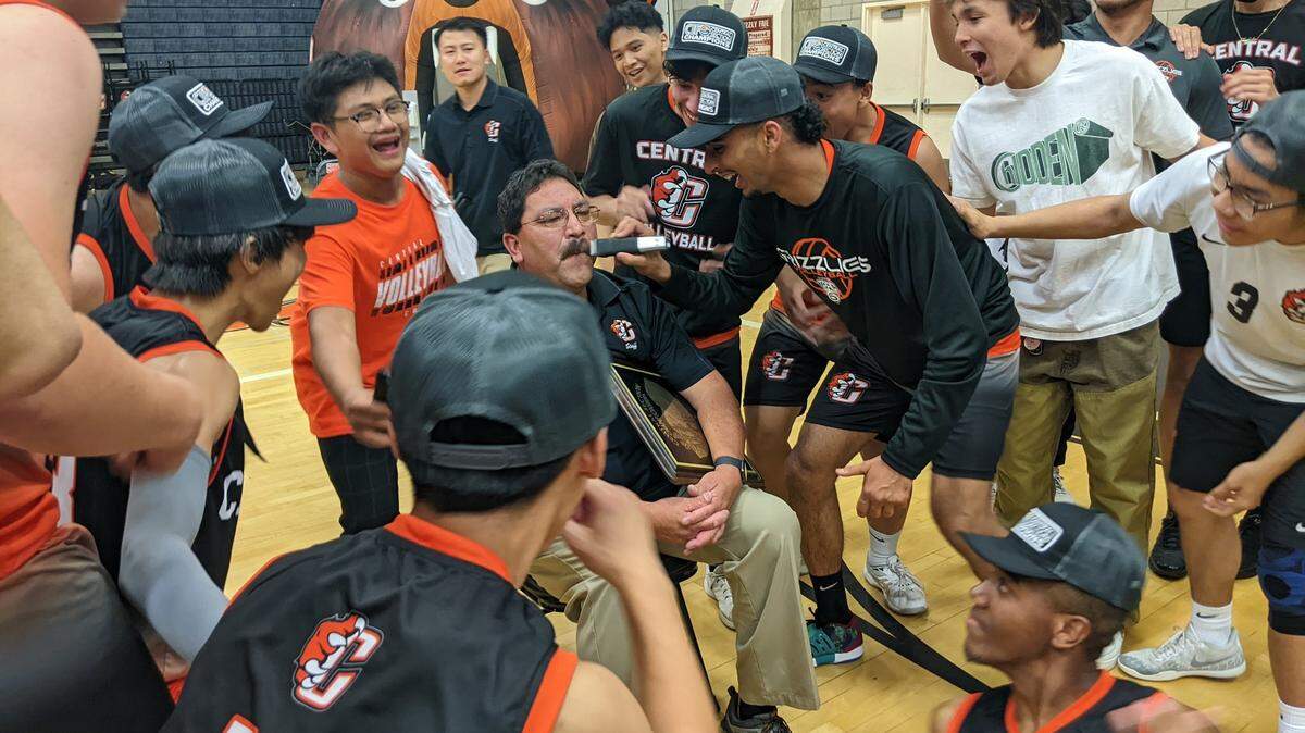 Central High boys volleyball coach Darin Williams lets players shave off his mustache that he had for 37 years after the Grizzlies won the Central Section Division II title on Thursday, May 12, 2022.