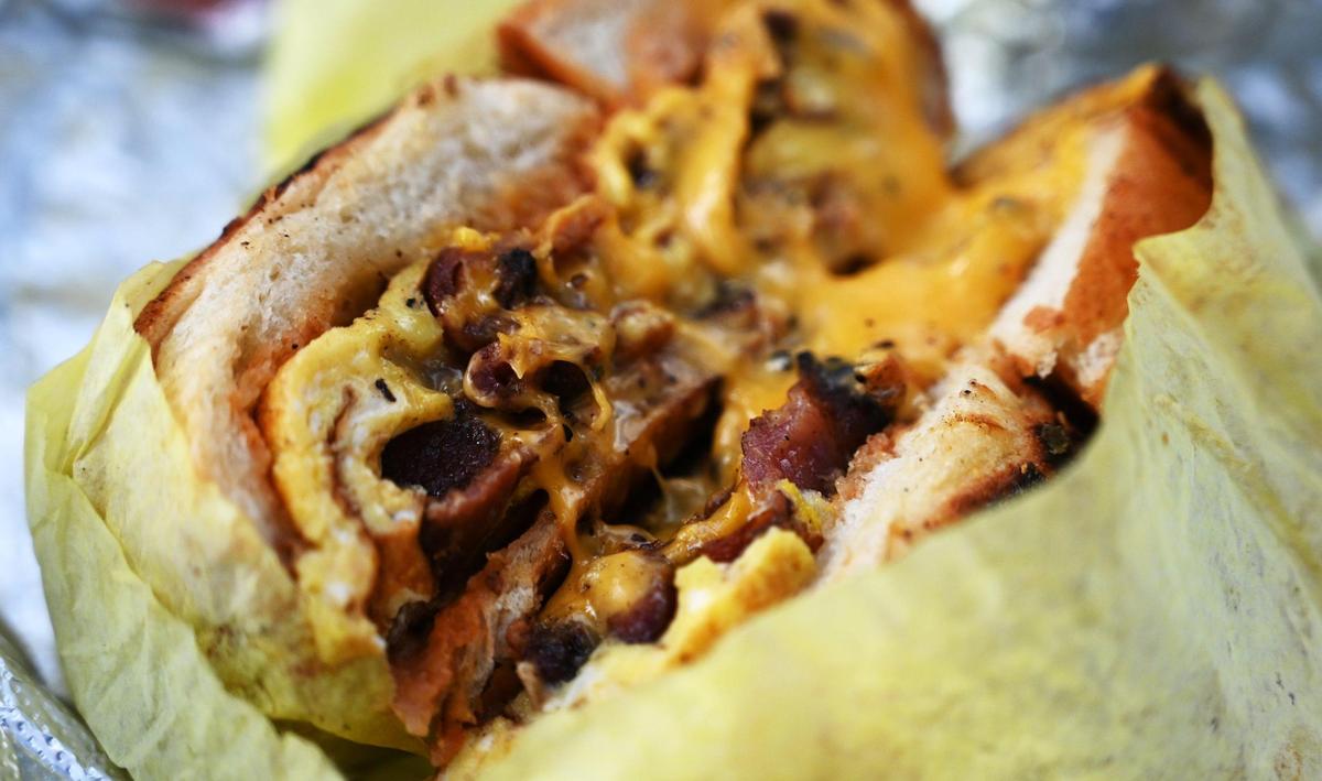 The Bacon, Egg & Cheese breakfast sandwich consisting of bacon, two fresh fried eggs and American cheese on a Kaiser roll is one of the items Eddie Wutangsy features at his My Guy Market, a ghost kitchen along Belmont Avenue just north of downtown that purposes itself as an online app-driven bodega for customers offering New York City-inspired food and more. Photographed Friday, Jan. 20, 2023 in Fresno.