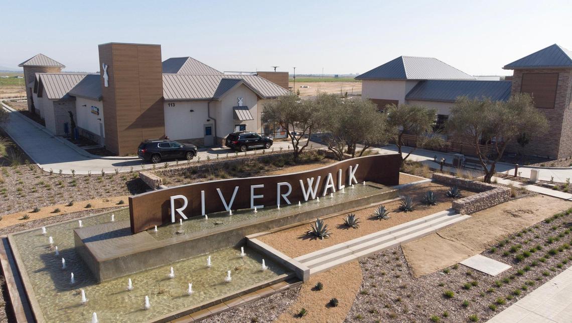 An aerial view of the new Riverwalk shopping center next to Riverstone housing development west of Highway 41 and south of Avenue 12 near Madera Ranchos. Photographed Wednesady, Jan. 26, 2022.