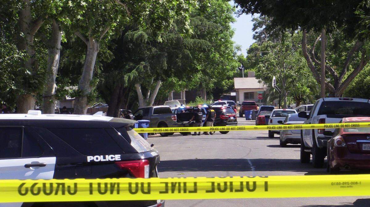 Police close off a neighborhood in Fresno adjacent to Roosevelt High due to a reportedly armed man who refused to come out of his home on Thursday, May 18, 2023.