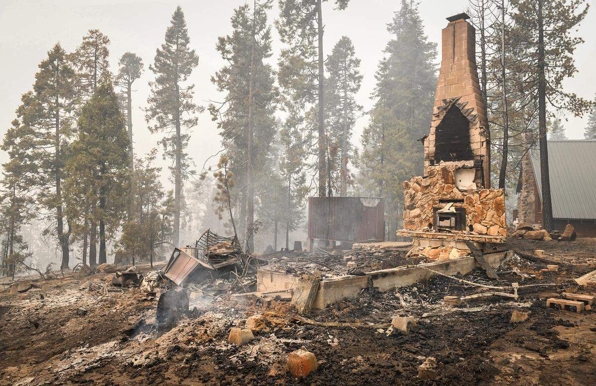 A cabin in Shaver Lake appears burned to the ground by the Creek Fire on Tuesday, Sept. 8, 2020. Several homes in the Shaver Lake Heights area west of the business area were burned in the fire, but many more were spared.