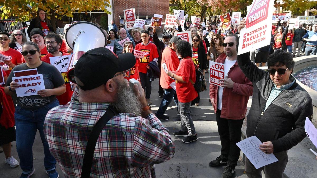 Hundreds gathered as the Fresno Chapter of the California Faculty Association held a rally and march calling attention to contract negotiations Tuesday morning, Nov. 7, 2023 in Fresno.