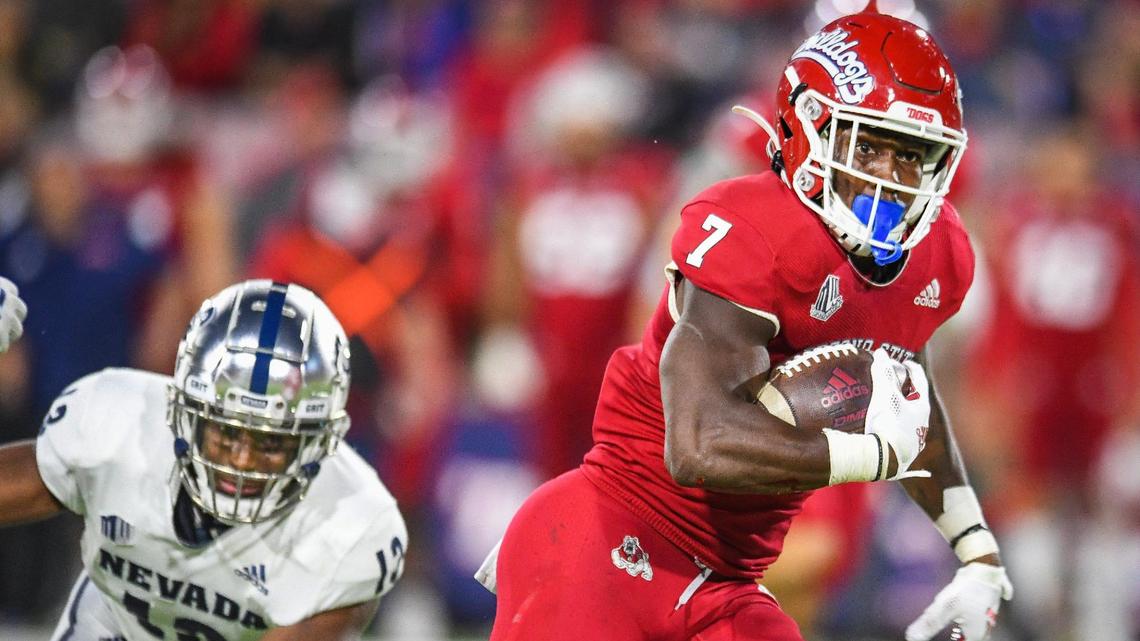 Fresno State’s Jordan Mims dashes up field on a long gain against Nevada during their game at Bulldog Stadium on Saturday, Oct. 23, 2021.