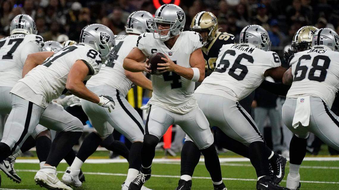 Las Vegas Raiders quarterback Derek Carr scrambles during the first half of an NFL football game against the New Orleans Saints Tuesday, Jan. 1, 2019, in New Orleans.