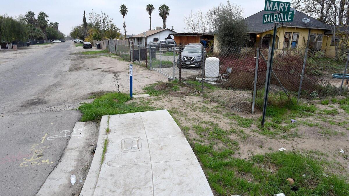 A sidewalk, briefly leading from the border of the Ulta distribution center abruptly ends on the edge of the Daleville housing tract. An elderly Fresno resident says he fears falling due to broken, blocked and inaccessible sidewalks and urges the city to make repairs for pedestrian safety.