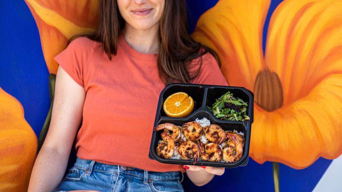 WaBa Grill serves entrees like this one, featuring jumbo shrimp with WaBa sauce over rice.