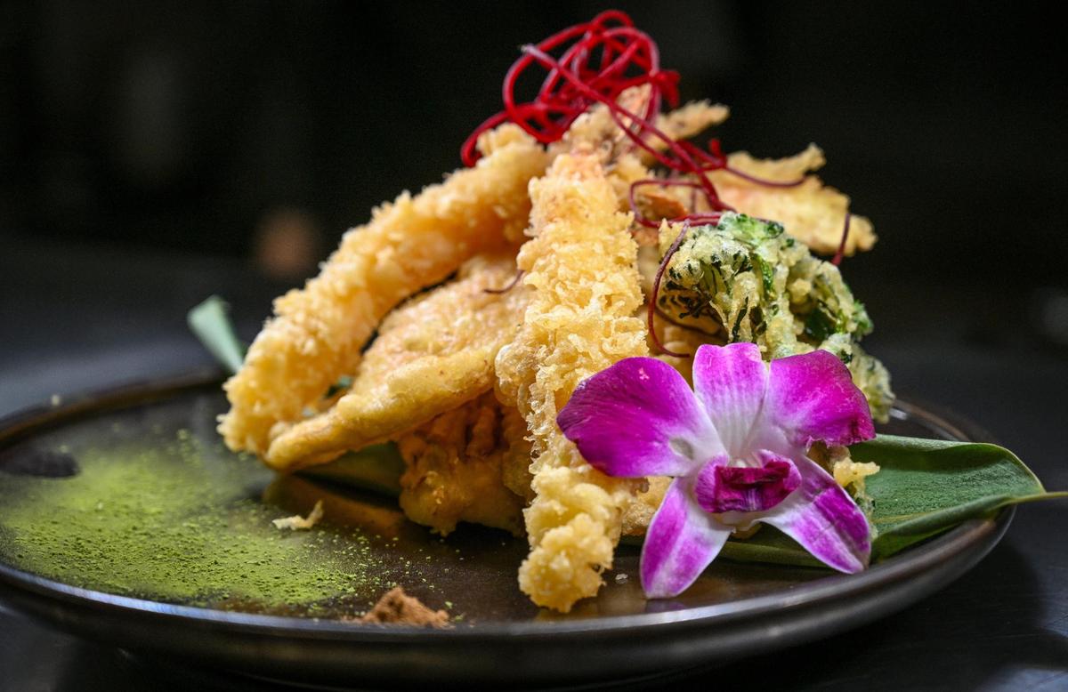 Tempura with shrimp and vegetables is ready to be served at O-iza Japanese Cuisine in the River Park shopping center.