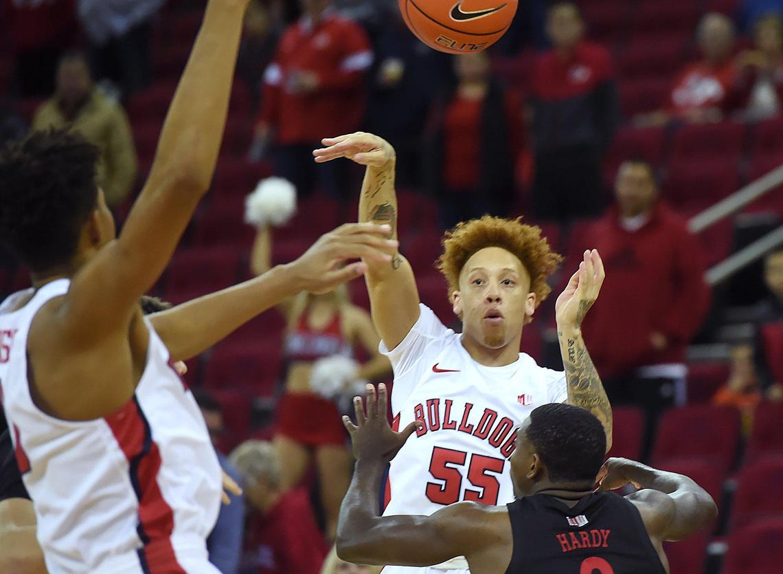 Fresno State guard Noah Blackwell, top right, gets a pass over UNLV’s Amauri Hardy in the Bulldogs’ 81-80 double overtime loss to the Rebels in their Mountain West Conference opener Wednesday, Dec. 4, 2019 in Fresno.