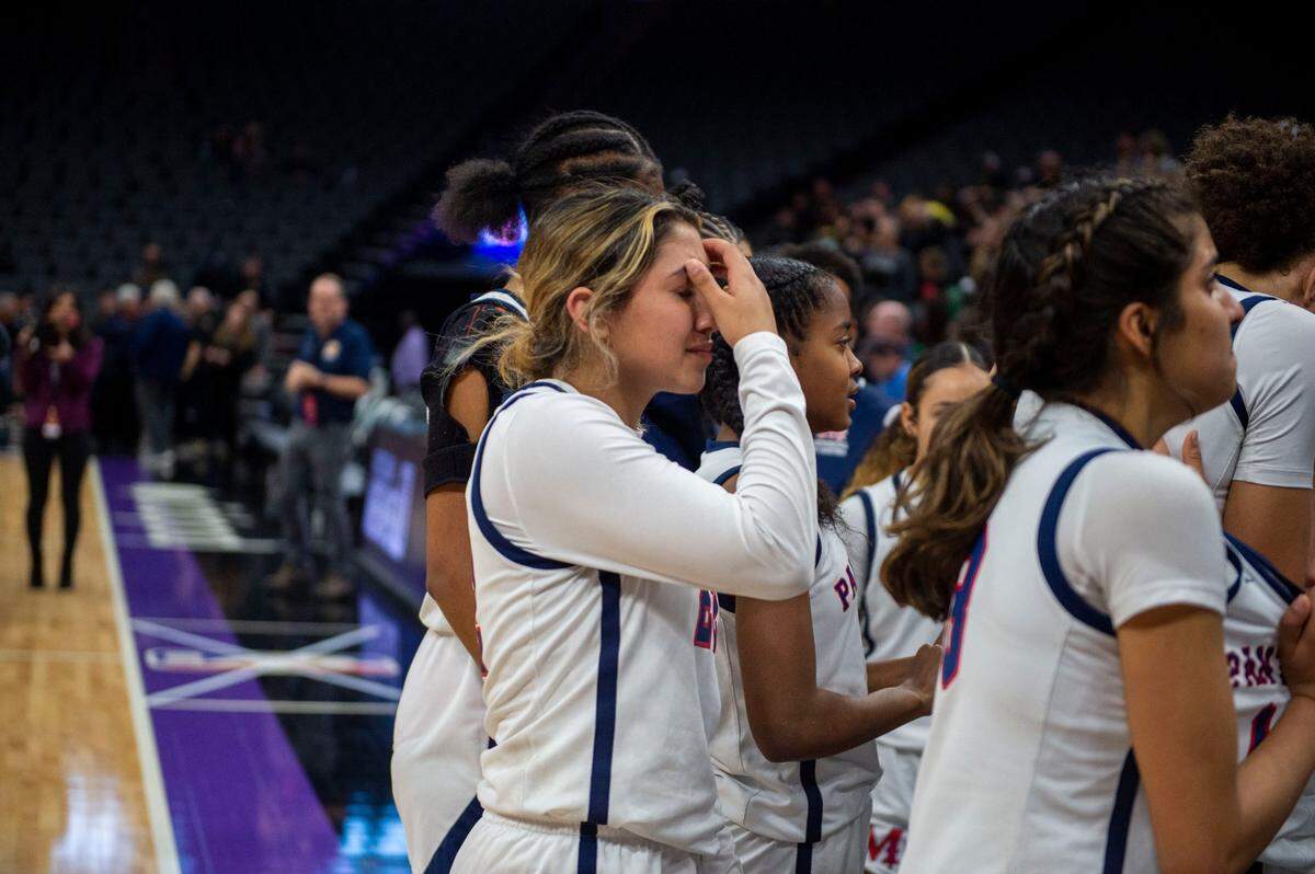 San Joaquin Memorial’s Asha Sra reacts to their loss against Sage Hill during the CIF State Division II basketball championship game on Saturday at Golden 1 Center in Sacramento.