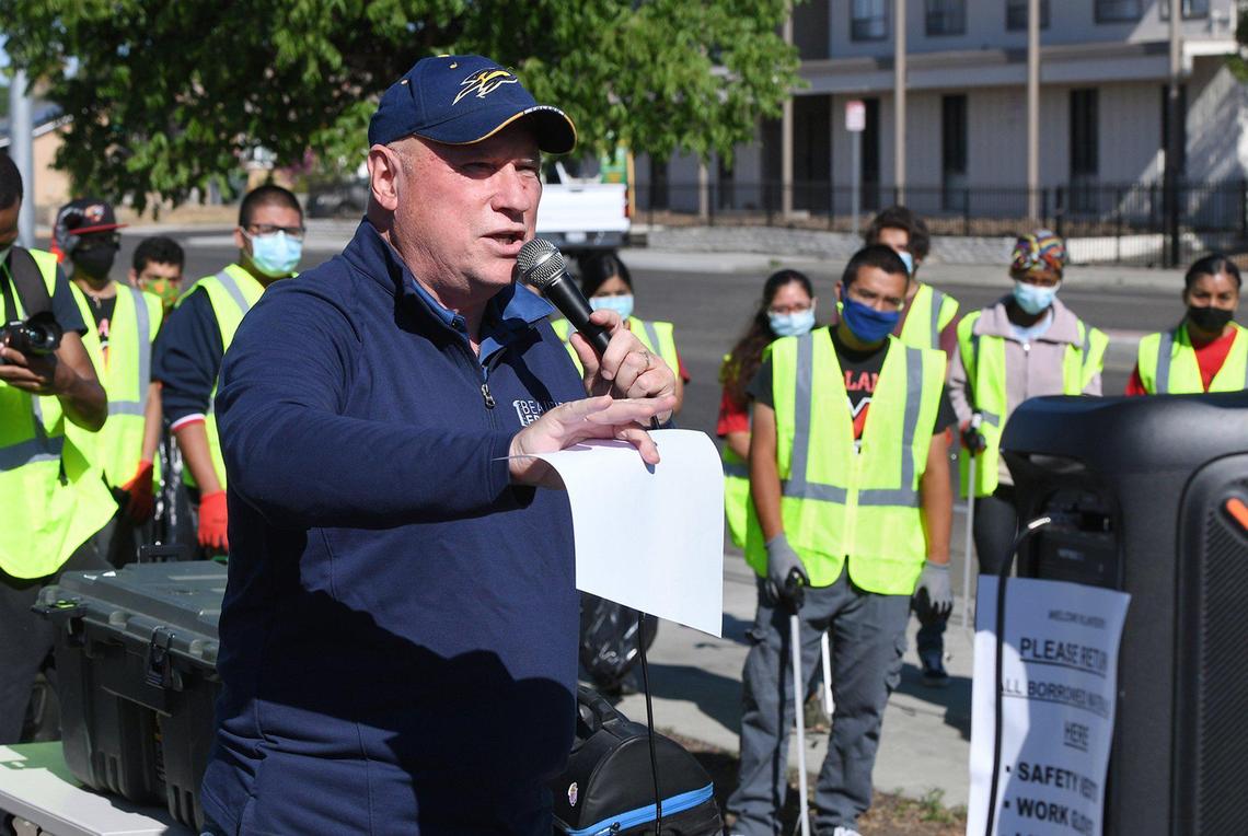 Beautify Fresno Director Mark Standriff addresses over 100 volunteers gathered Saturday morning, May 1, 2021, to assist another cleanup event focusing on the area around Shields and West avenues in central Fresno.
