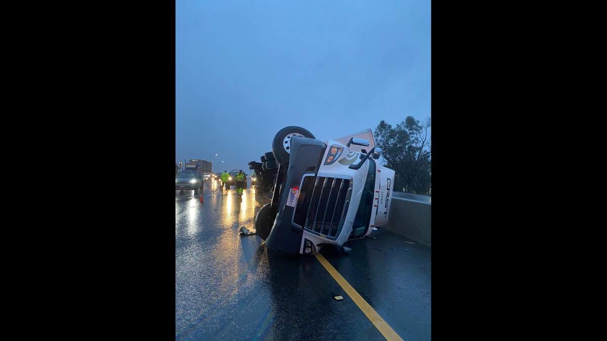 Traffic on Highway 99 in Fresno was backed up for miles Thursday, Dec. 9, 2021, after a big rig overturned and blocked a part of the roadway, according to California Highway Patrol.