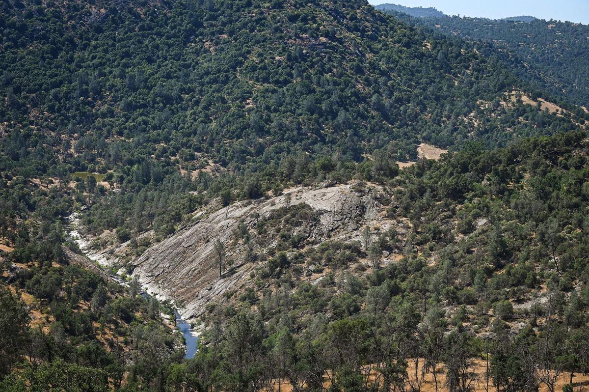 The Fresno River meanders west toward the San Joaquin Valley from the Wright Ranch and the old Grub Gulch mining town off Road 600 in Madera County. The property was recently acquired as a conservation easement by the Sierra Foothill Conservancy.
