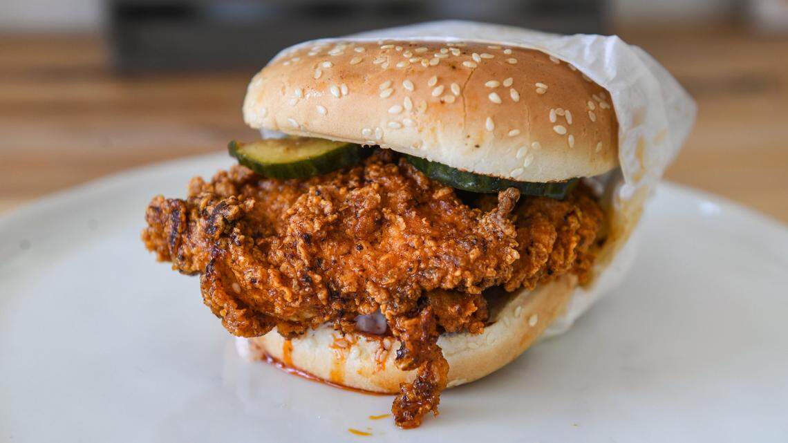 A hot chicken sandwich with homemade pickles and slaw from Pacific Fried Chicken, a locally owned restaurant recently opened in southeast Fresno.