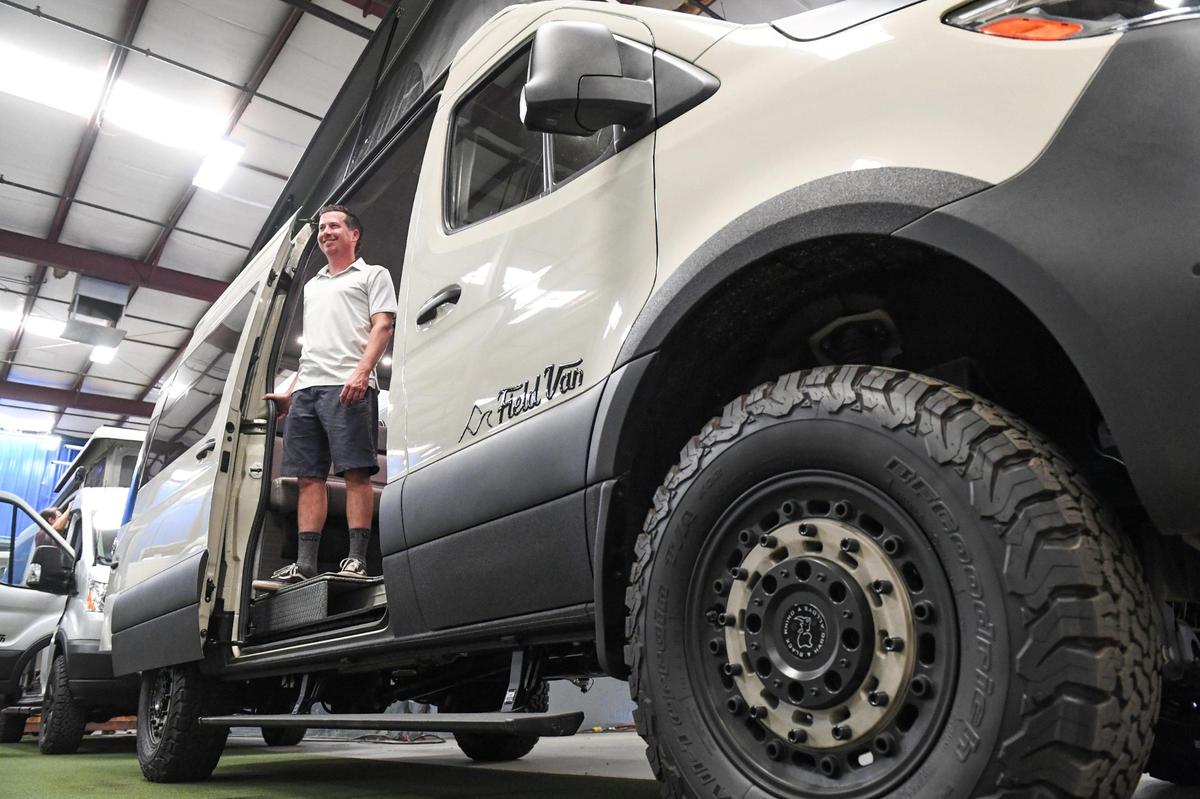 Jonny Feld, CEO of Field Van, stands in one of the company’s high-end customized camper vans on Wednesday, Aug 11, 2021.