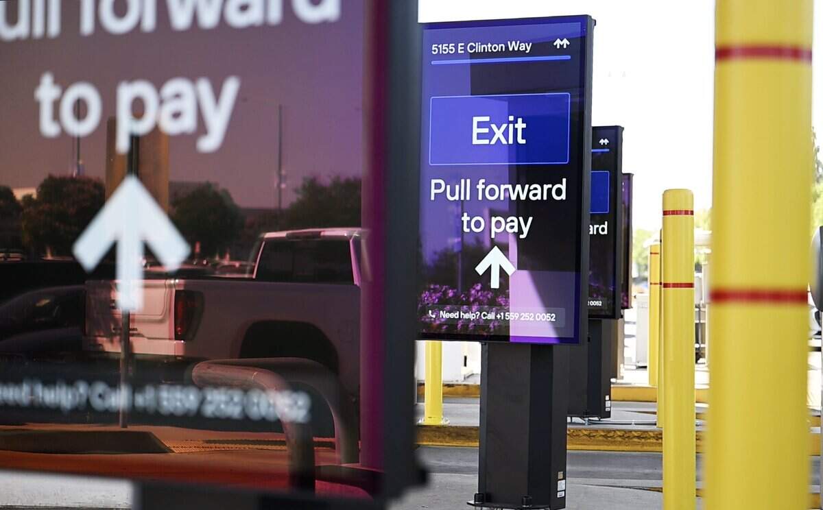 Large screens direct drivers through Fresno Yosemite International Airport's new parking system, Tuesday morning, July 14, 2026 in Fresno.