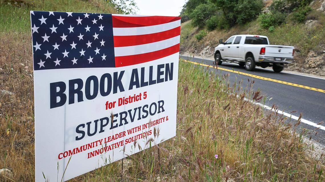 A sign for Madera County Board of Supervisors candidate Charles Brook Allen, who is running for the District 5 seat, stands on Highway 41 near Coarsegold in Madera County on Tuesday, March 31, 2026.
