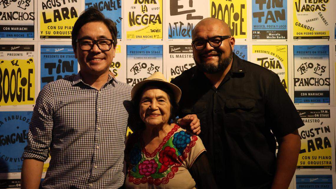 Dolores Huerta, center, with Lee Herrick, left, and Joseph Ríos during ArtHop in Fresno, California, on Thursday, Sept. 7, 2023.