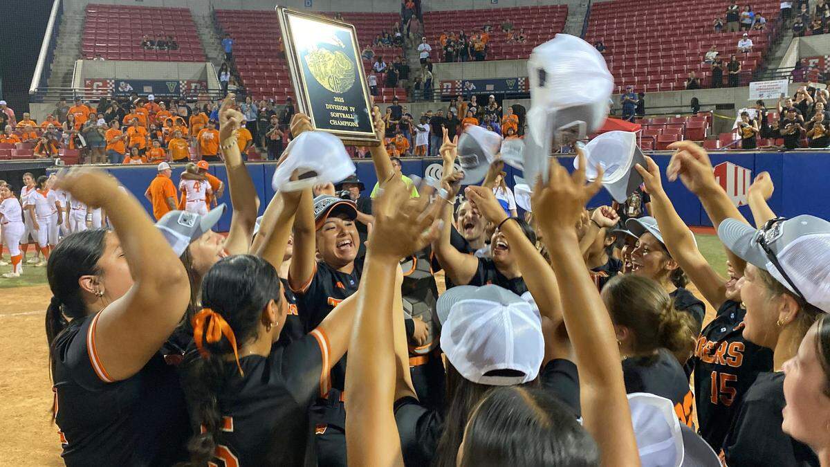 Woodlake celebrates a Central Section Division IV championship after an 8-1 victory over Coalinga on Thursday, May 29, 2025.