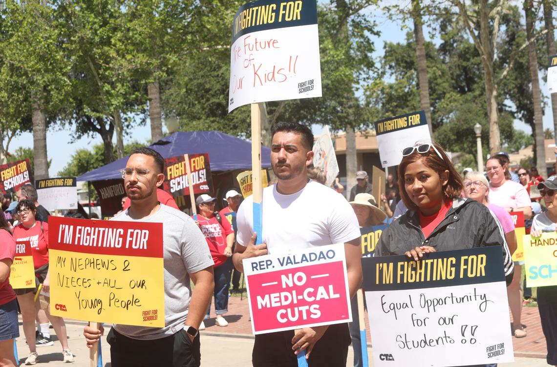 Central Valley educators, families, students and supporters demand U.S. Rep. David Valadao to defend funding for valley schools and urge the Republican congressman to oppose federal cuts to public education on May 17 in Hanford CA.