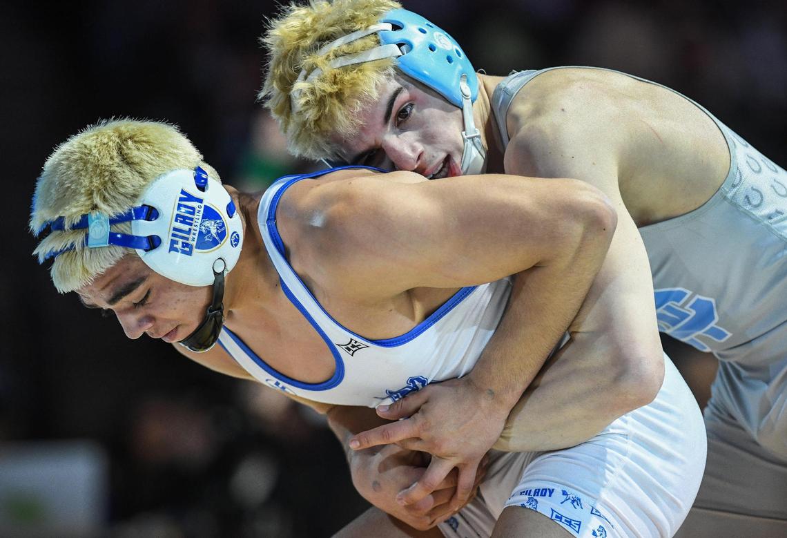 Clovis North’s Gavin Bauder, top, wrestles Daniel Zepeda in the boys 132-pound CIF State Wrestling Championship match at Mechanics Bank Arena in Bakersfield on Saturday, Feb. 25, 2023. Bauder lost the bout and finished second overall.