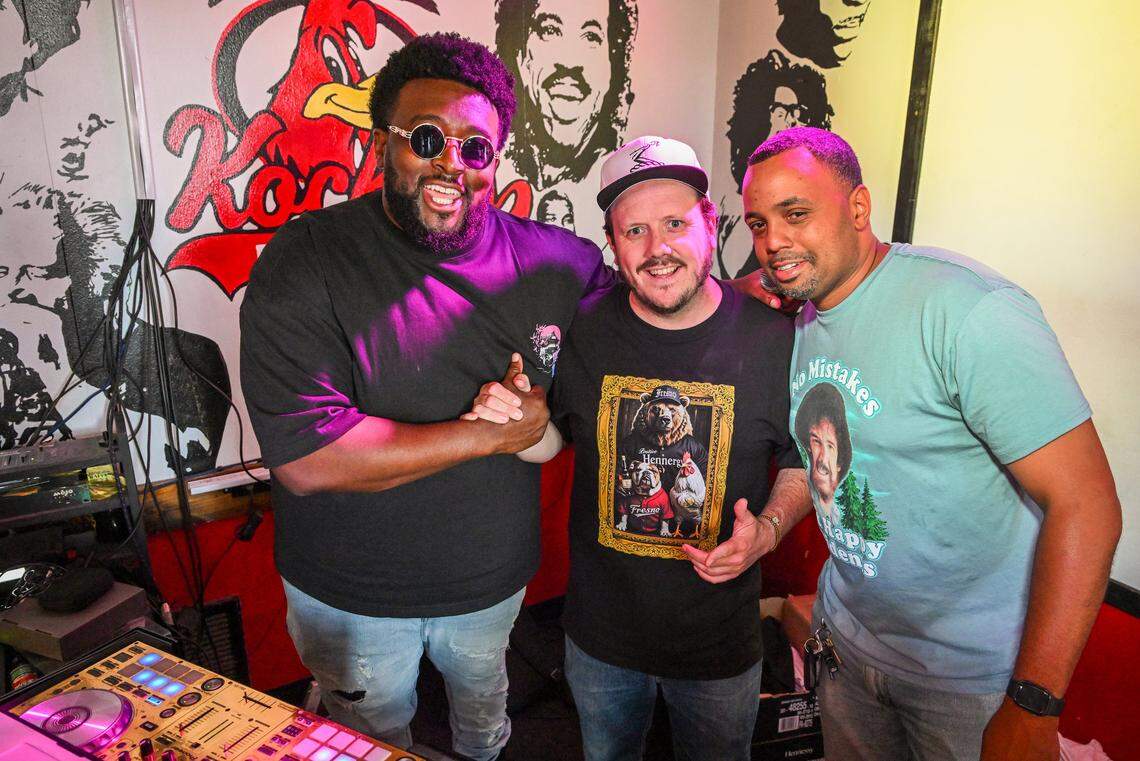 DJ Kay Rich, from left, Fresno Grizzlies graphic designer Sam Hansen, and Kocky's Bar & Grill co-woner Michael Smith pose for a photo during their Butta Brunch on Sunday, Aug. 10, 2025. Hansen, who has a passion for community and culture in downtown Fresno, helped launch the idea for the Butta Brunch with friends Rich and Smith.