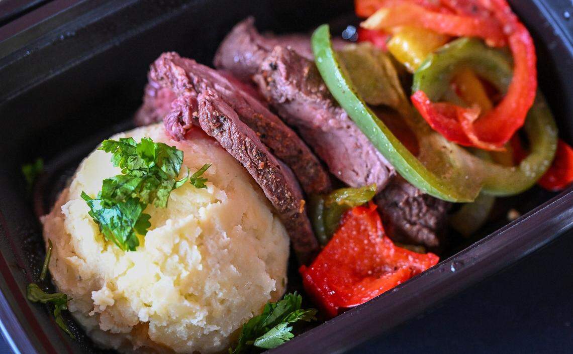 Grilled tri tip, potatoes and veggies are among the low-calorie, high-protein healthy meal choices, prepackaged and ready for delivery or grab and go at Fire Foods meal prep in Fresno. 
