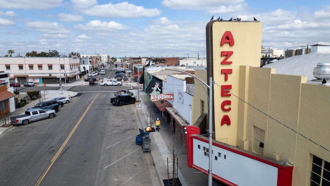 Looking down F Street at Kern in front of the Azteca theatre in Fresno’s Chinatown on Thursday, March 27, 2025. Chinatown Fresno is sponsoring a workshop by the Incremental Development Alliance to help develop empty lots and unused buildings in the area. Inc Dev, is a nonprofit alliance that empowers small developers and local communities to create stronger neighborhoods through incremental, bottom-up development.