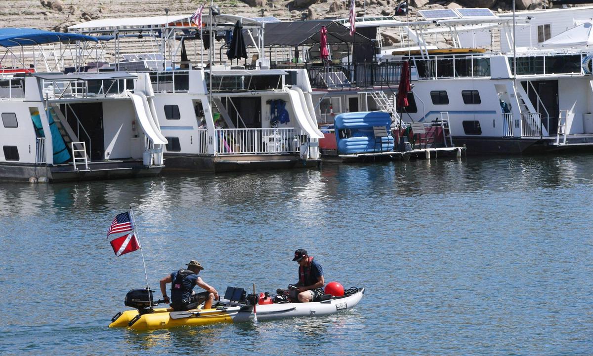 One of two search teams with Adventures with Purpose searches for Jolissa Fuentes at Pine Flat Lake’s Deer Creek marina Friday morning, Aug. 26, 2022 in Fresno.