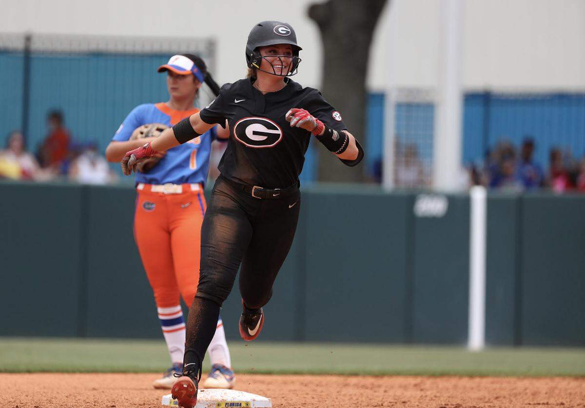 Former Washington Union star Sydney Kuma hits a home run for Georgia on Saturday, May 29, 2021. The Bulldogs are going to the Women’s College World Series.