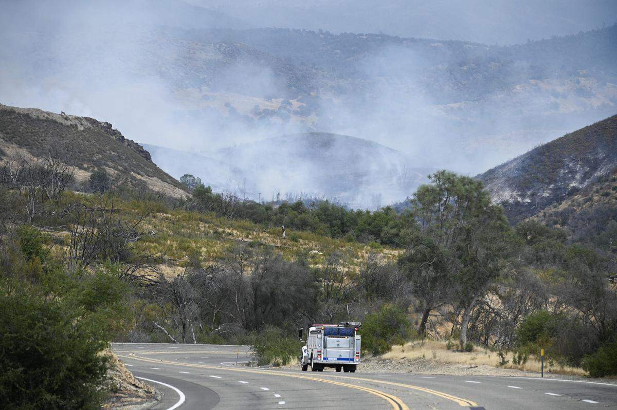 Smoke from the Agua Fria fire is show off Highway 140 on July 18, 2022.