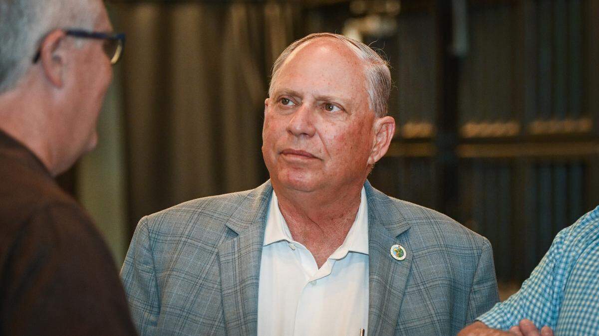Fresno County Supervisor Buddy Mendes talks with supporters during an election watch party at the Fresno Deputy Sheriff’s Association building in downtown Fresno on Tuesday, June 7, 2022.