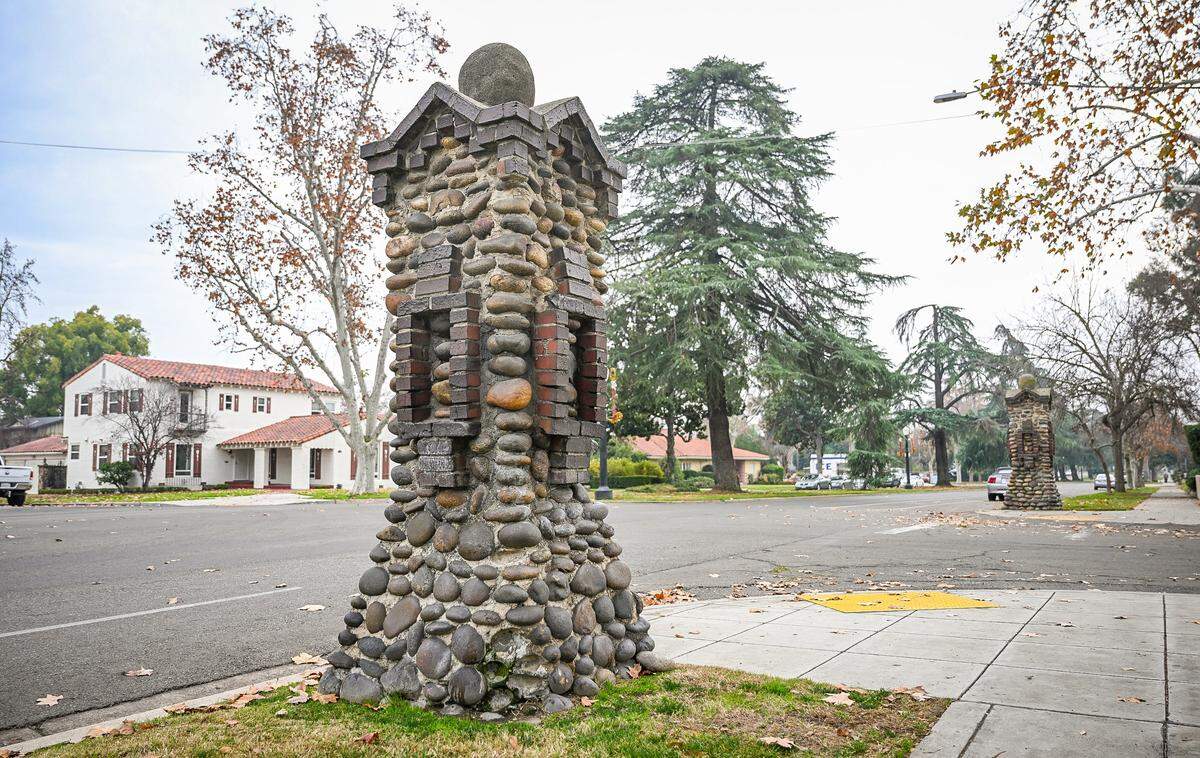 Two Fresno High neighborhood stone pillars stand at Michigan Avenue at Van Ness Boulevard on Tuesday, Dec. 30, 2025. 