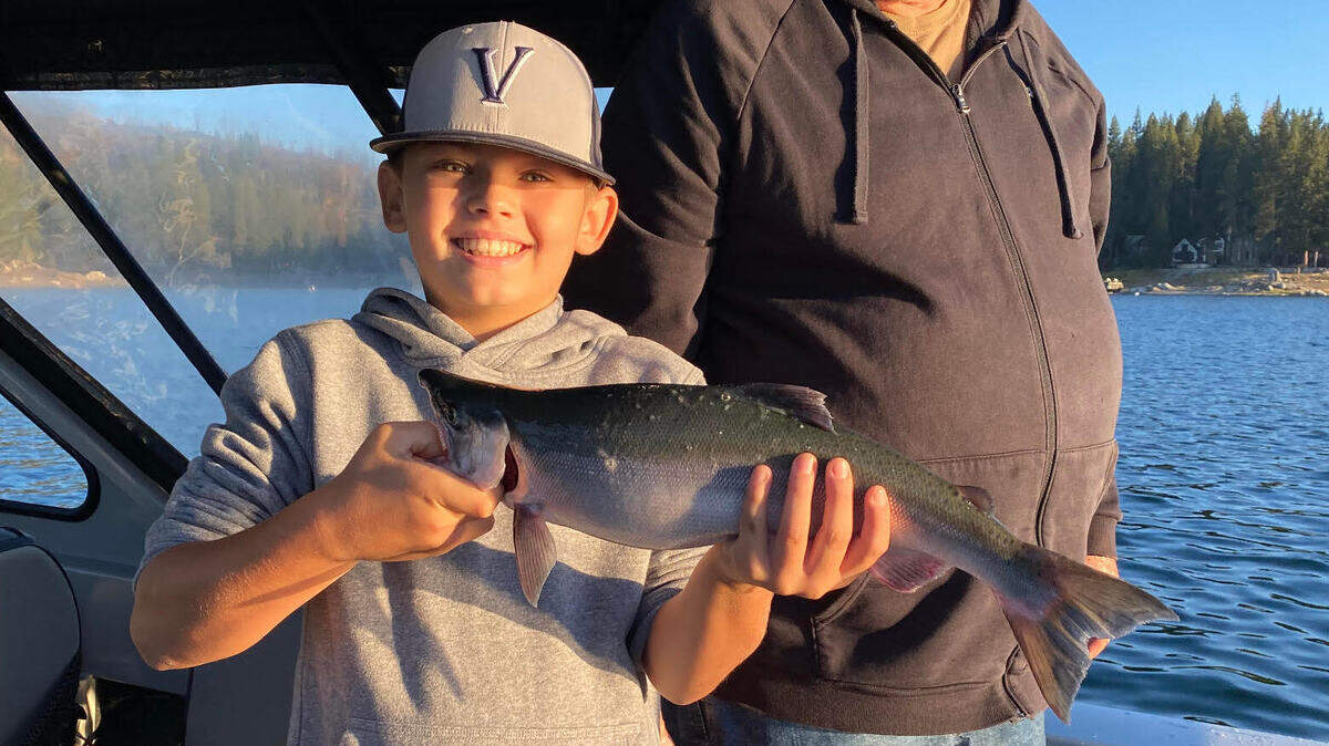 Ten year-old Reed Schiebelhut, fishing with his grandpa on Shaver Lake on Aug 6, landed his first kokanee which measured 20 inches.