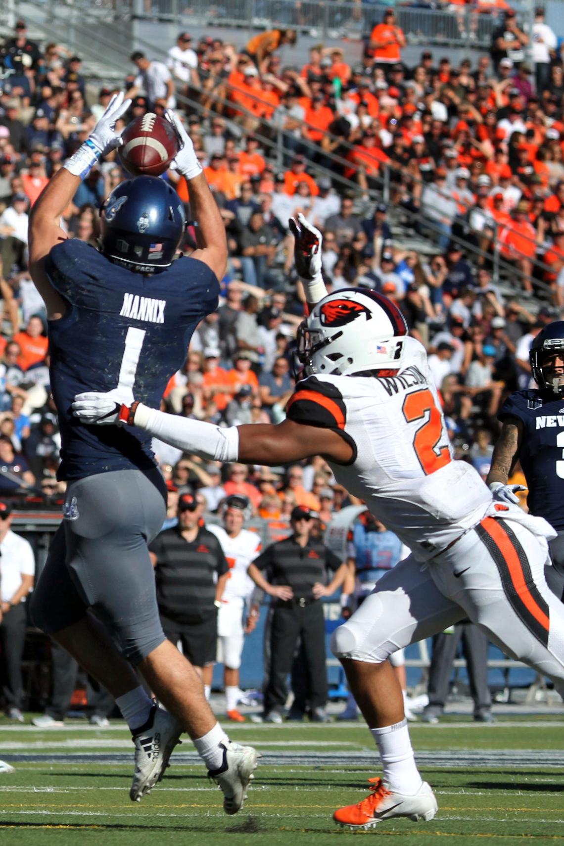 Nevada’s McLane Mannix (1) catches a touchdown pass in the first quarter of a 37-35 victory over the Beavers, Saturday, Sept. 15, 2018, in Reno. Mannix is averaging 19.0 yards on 21 receptions this season and has caught five touchdown passes, third in the Mountain West Conference.
