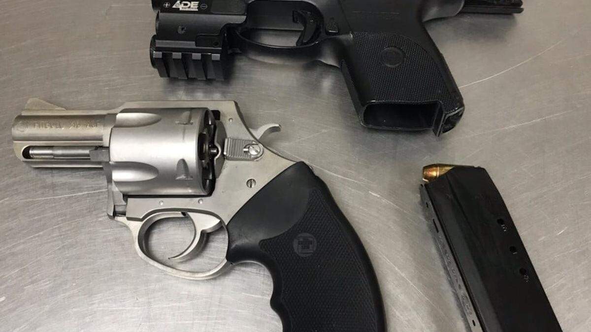 Merced police said one of the suspects had these two stolen handguns in his possession.