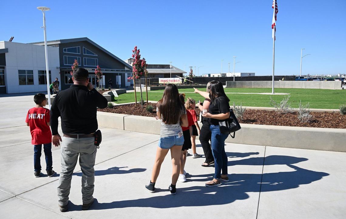 A family tours Clovis Unified’s newest school Hirayama Elementary Wednesday morning, Aug. 14, 2024 in Fresno.