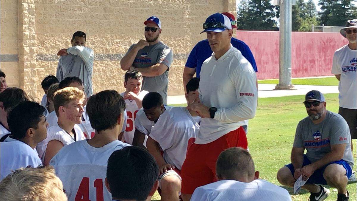 Buchanan High football coach Matt Giordano talks during the opening day of fall camp on Monday, July 29, 2019.