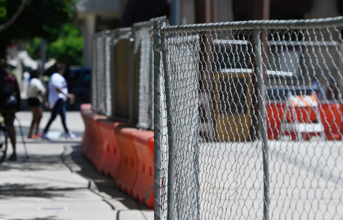 Fencing blocks off a construction zone to the plaza at Fulton and Mariposa streets Thursday, June 20, 2024 in downtown Fresno.