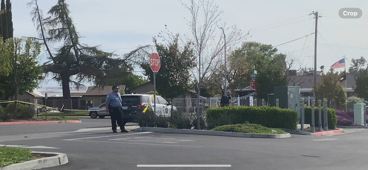 Officers taped off part of Marketplace at El Paseo parking lot after a stabbing at a home in Fresno, California on Monday, April 7, 2025.