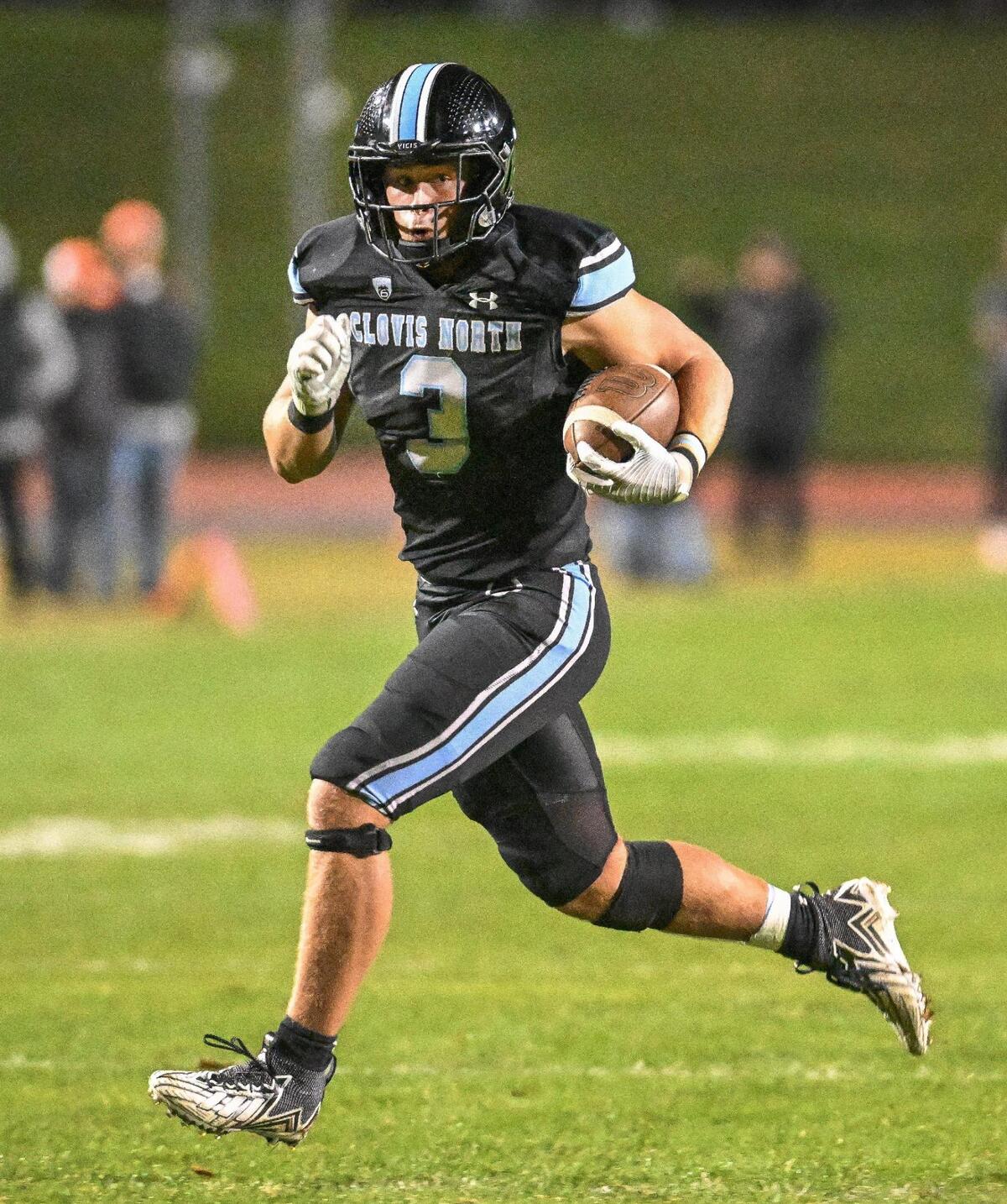 Clovis North running back Mckay Madsen finds lots of daylight after getting past the Central defensive line as he trots into the end zone for an early touchdown in their Central Section Division 1 football championship game at Veterans Memorial Stadium in Clovis on Friday, Nov. 24, 2023.